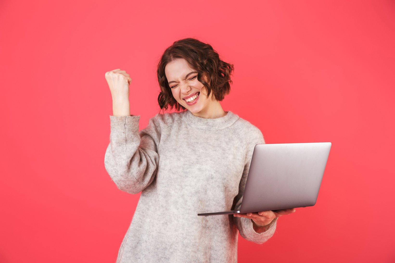 Portrait of a Cheerful Young Woman Standing